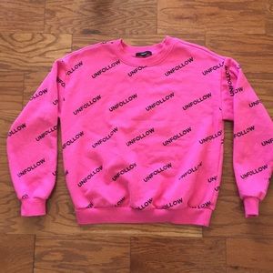 Forever 21 “Unfollow” pink and black sweatshirt